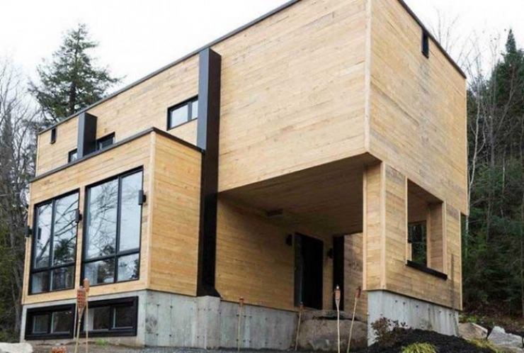 Illustration de l'article : She recycles 4 shipping containers and transforms them in a beautiful way... You won't believe the results!